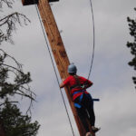 Photo Gallery: Teen Climbing Phone Pole During Team Day