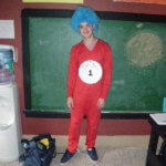 a teen in his thing 1 halloween costume