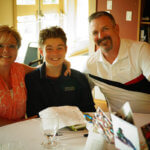 Photo Gallery: Teen with His Parents During Parent Day