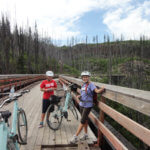 Photo Gallery: Teens Taking a Break from Biking on the Bridge