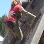 Photo Gallery: Teen Climbing Wall During Mudd, Sweat, and Tears Event