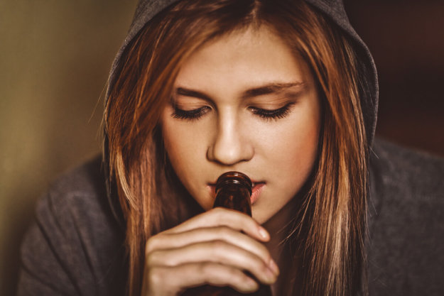 teen drinking beer