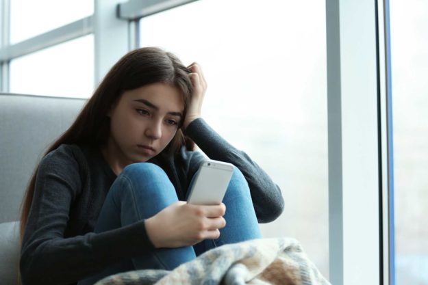 a teen struggles to cope with the symptoms of her depression without professional help and treatment