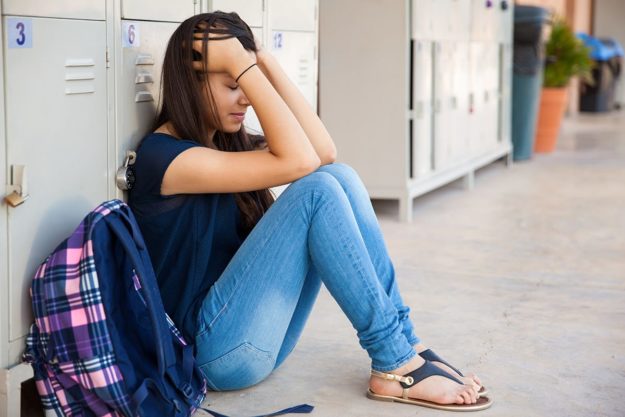 a teens childhood trauma impacts her ability to perform at school