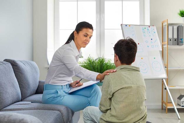 a young man learns cbt techniques in behavioural therapy and treatment