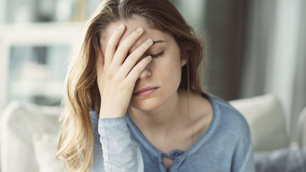a girl struggling with what causes depression in teens