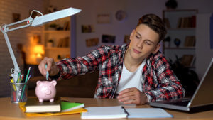 teen boy learns to save money from kelowna BC teen life skills coaching