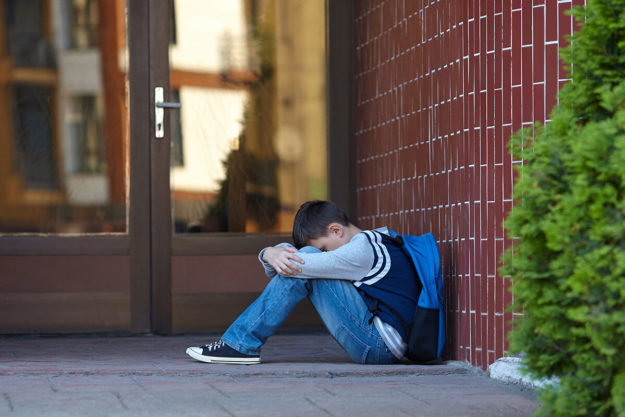 teen boy showing signs of anxiety in teens