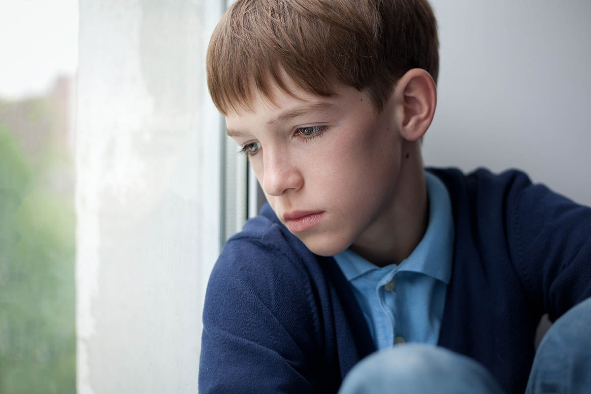 boy experiencing the impact of social isolation