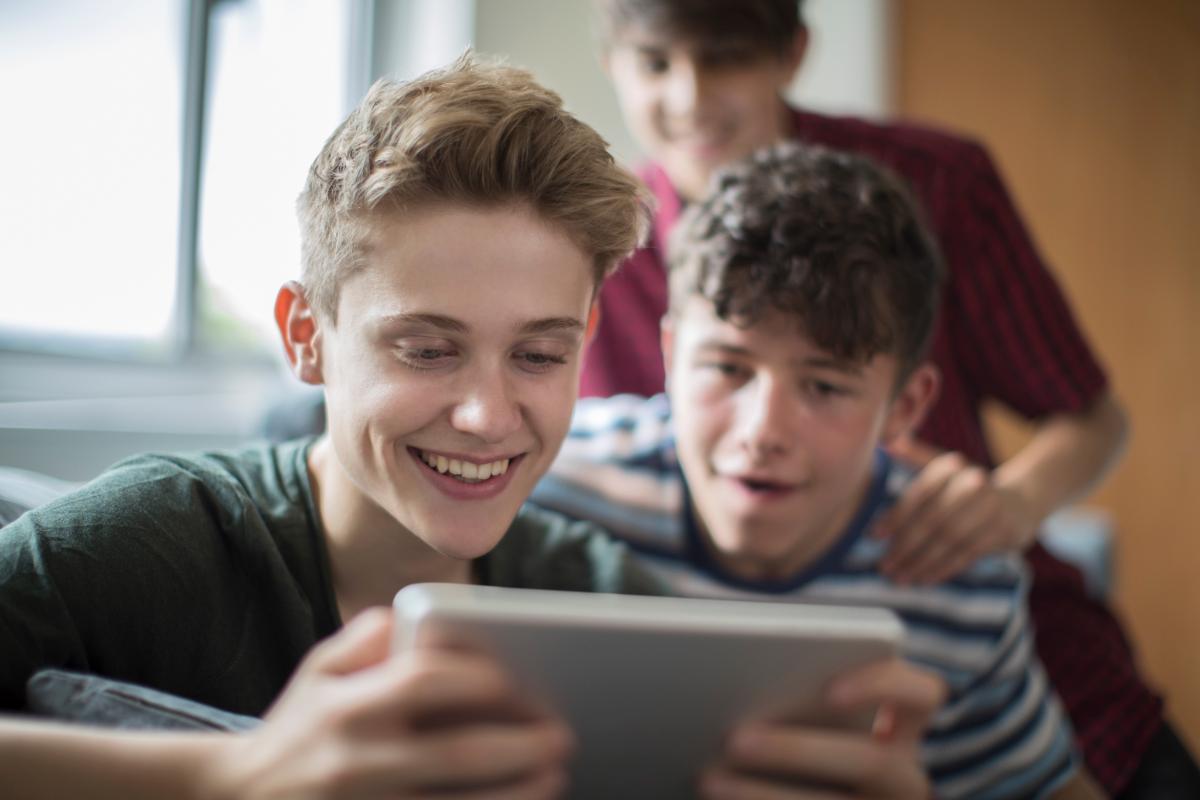 teens-playing-video-games-while-thinking-what-is-a-process-addiction