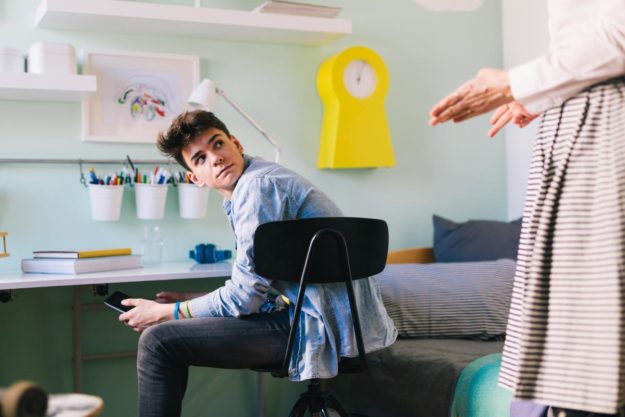 a disrespectful teen is reprimanded by a parent