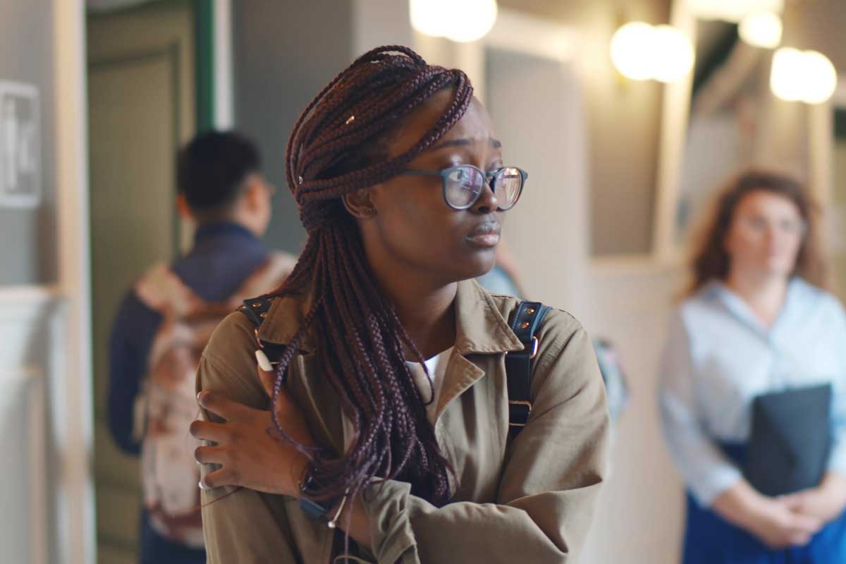 a teen girl appears distraught and concerned when learning about the signs of teens with anxiety