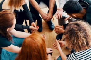 teens in a benzo abuse rehab program meet for group therapy 