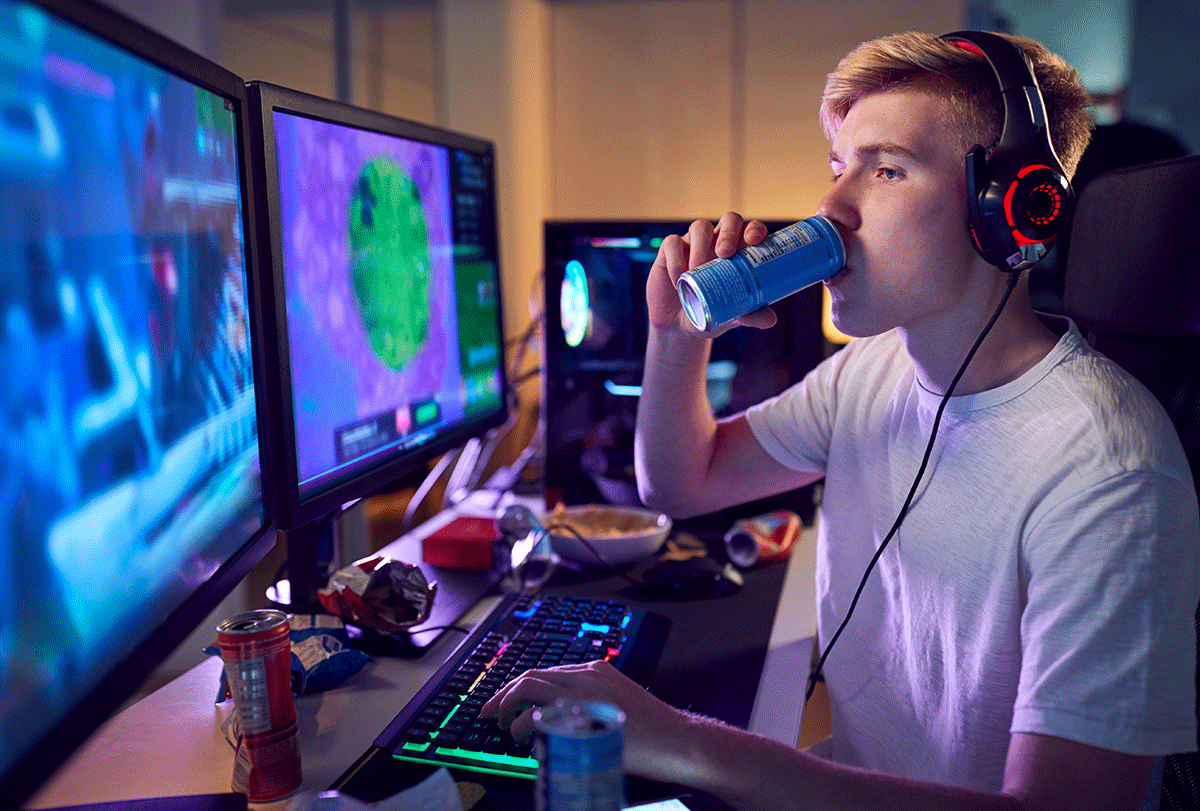 a teen spends a lot of time gaming on an elaborate set up